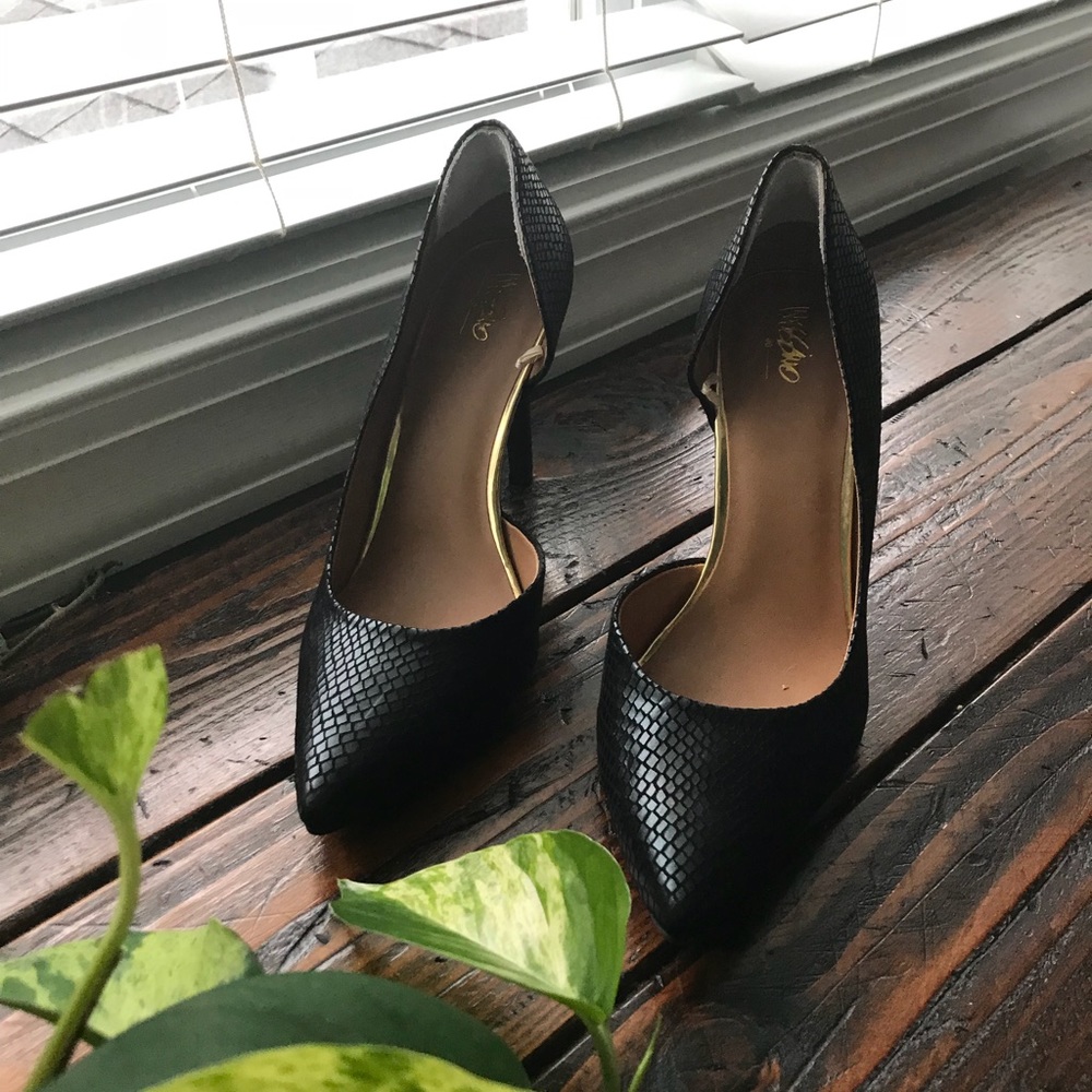 Snakeskin stilettos.
